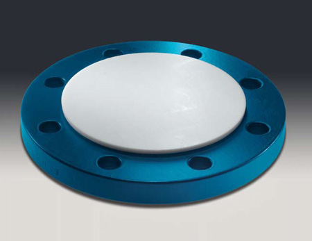 Lined blind flanges with PTFE cladding